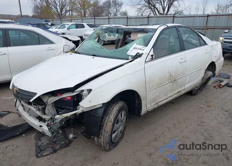 2003 Toyota Camry Le z USA, uszkodzony, nr VIN JTDBE32K930195126